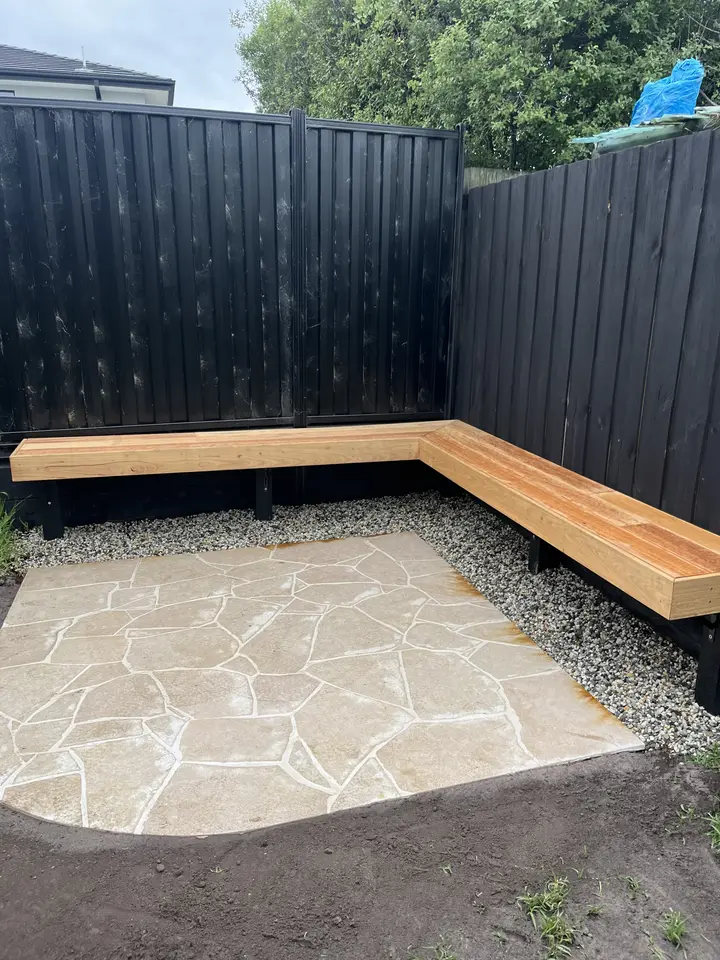 Carnegie: Crazy paving & timber seat, photo 1 of 5